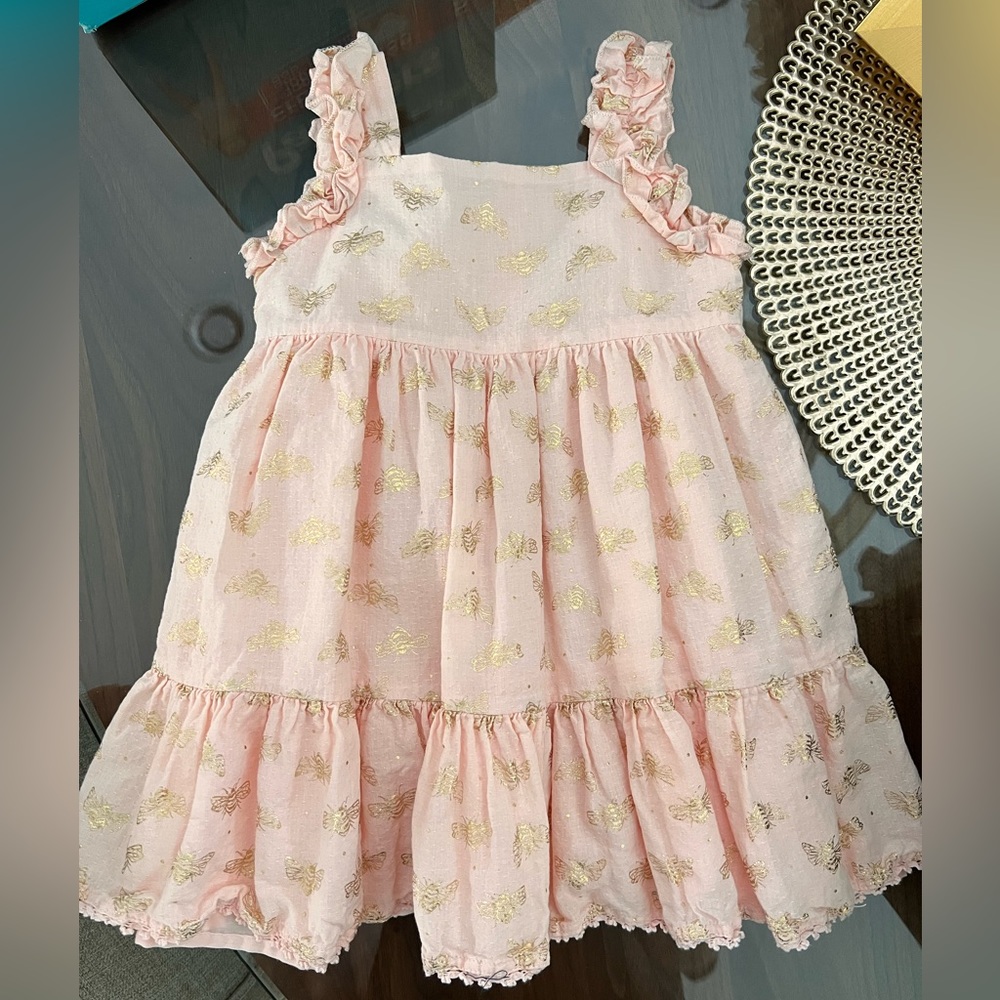 Pale pink dress w gold bee print.